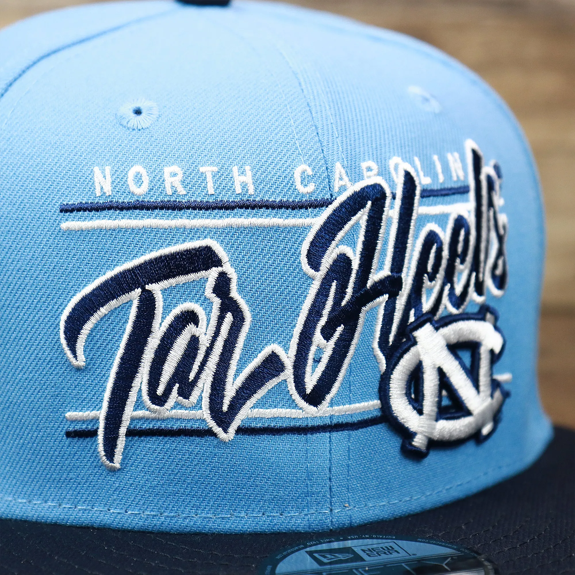 North Carolina Tar Heels Team Script Gray Bottom 9Fifty Snapback | Light Blue And Navy Blue Snap Cap