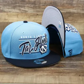 North Carolina Tar Heels Team Script Gray Bottom 9Fifty Snapback | Light Blue And Navy Blue Snap Cap