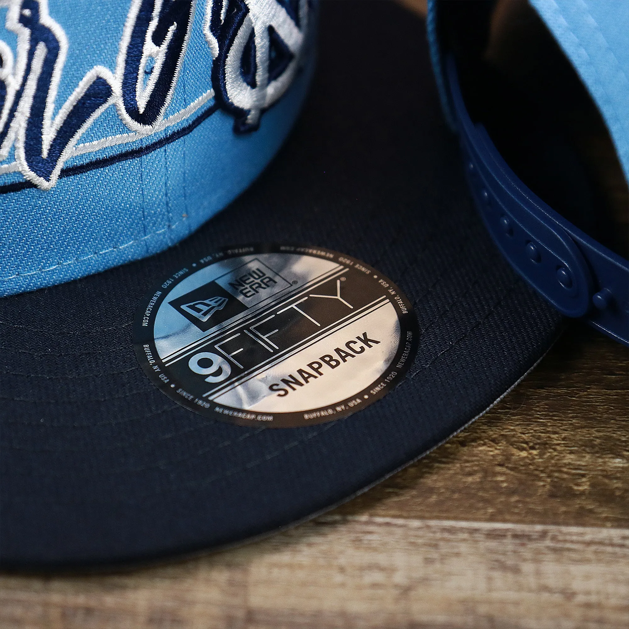 North Carolina Tar Heels Team Script Gray Bottom 9Fifty Snapback | Light Blue And Navy Blue Snap Cap