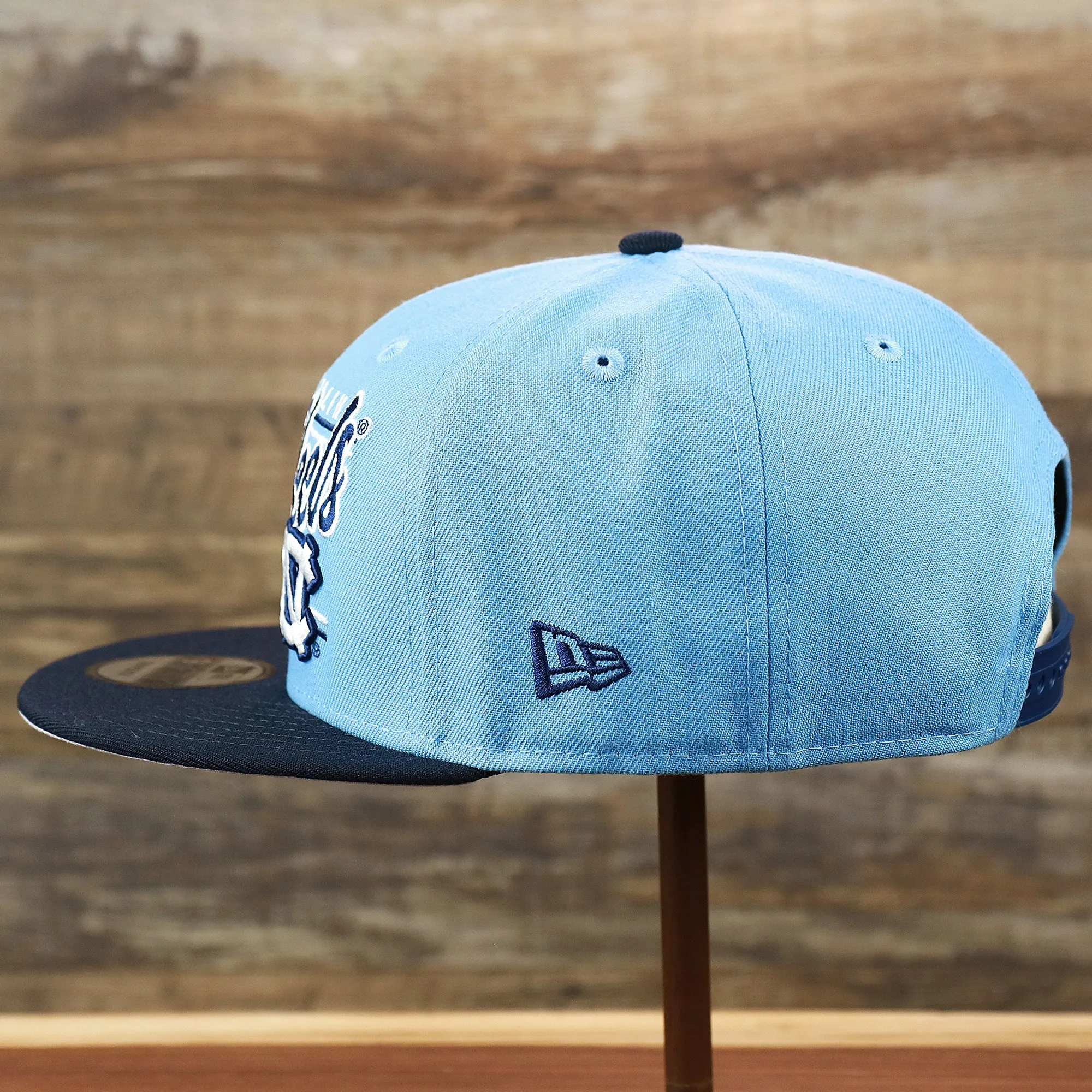 North Carolina Tar Heels Team Script Gray Bottom 9Fifty Snapback | Light Blue And Navy Blue Snap Cap