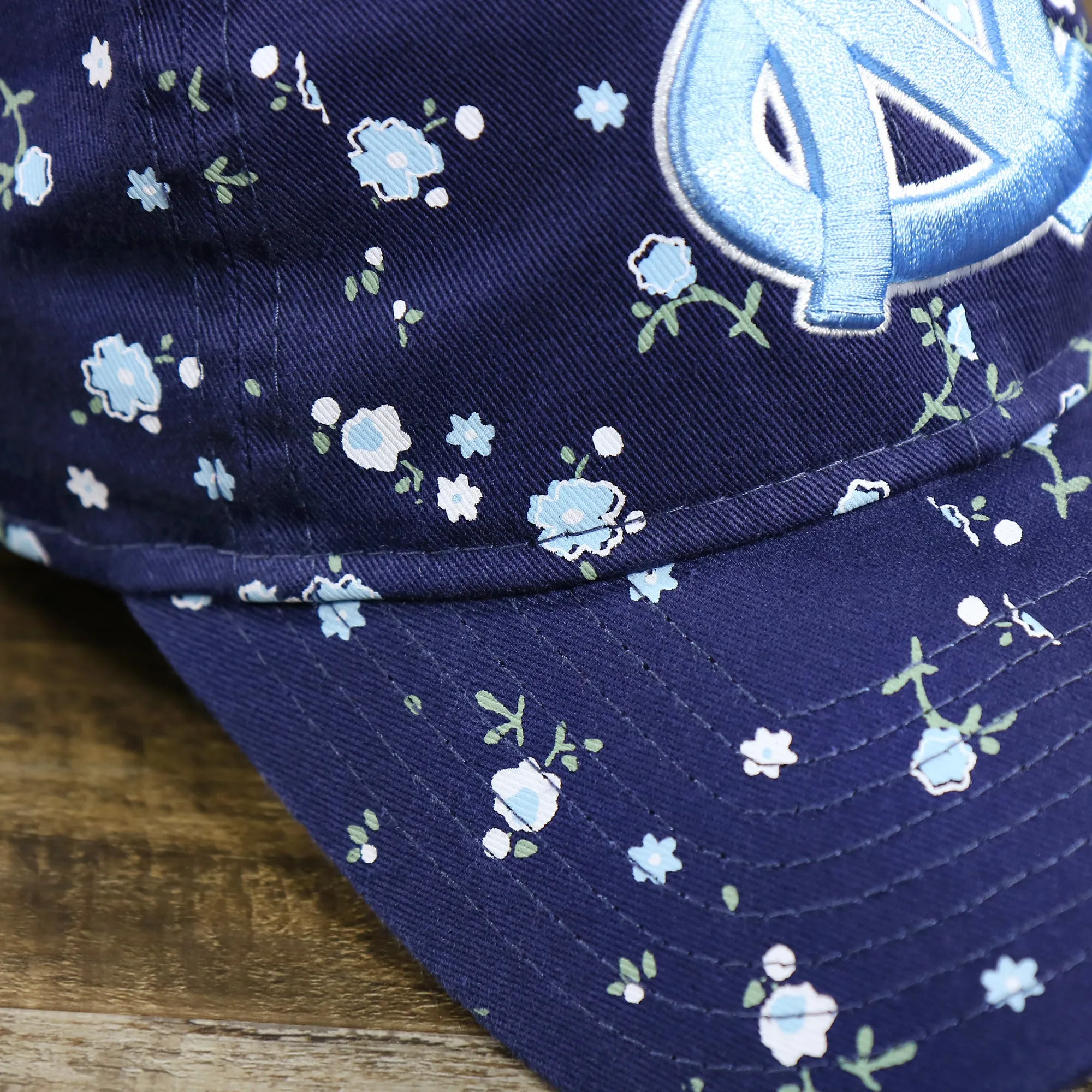 Women’s North Carolina Tar Heels All Over Micro Floral Print 9Twenty Dad hat | Navy Blue 9Twenty Hat